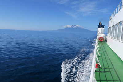 Scenic view of sea against blue sky