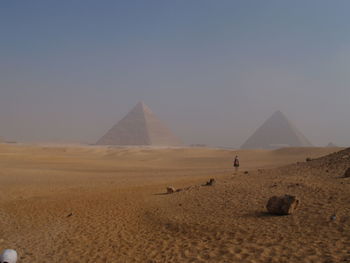 View of desert against clear sky