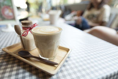 Close-up of coffee cup on table