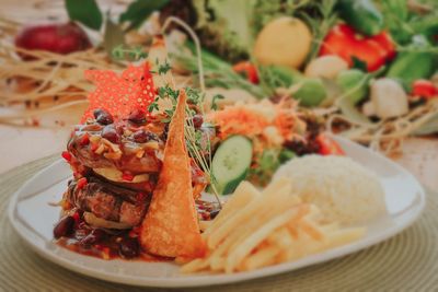 Close-up of served food in plate