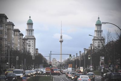 City street against cloudy sky