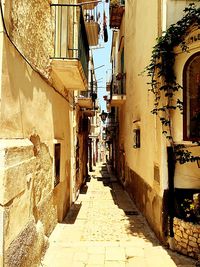 Narrow alley along buildings