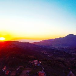 Scenic view of landscape against sky during sunset