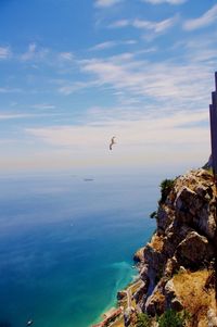 Scenic view of sea against blue sky