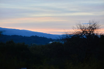 Scenic view of mountains at sunset