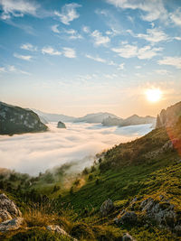 Scenic view of landscape against sky during sunset