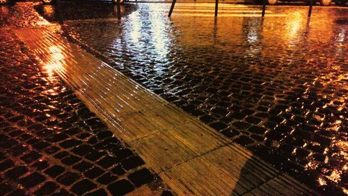 Reflection of sky in puddle