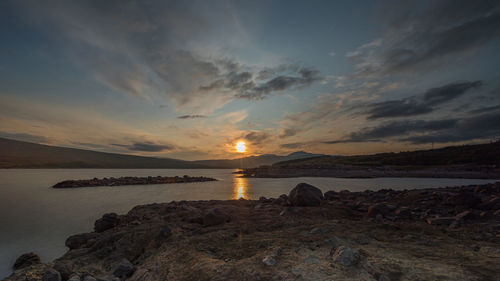 Scenic view of sea against sky during sunset