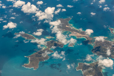 Aerial view of islands amidst ocean