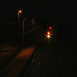 Illuminated street light at night