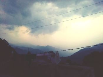 Scenic view of mountains against sky during sunset