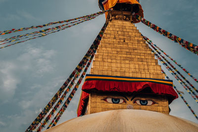Low angle view of boudhanath temple against sky