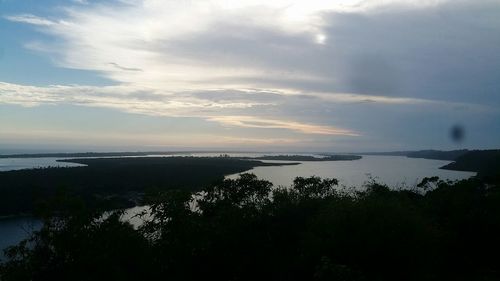 Scenic view of sea against sky at sunset