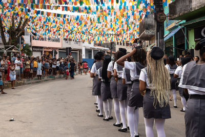 Members of cheganca de mouros barra nova feminina parading in line at the chegancas cultural meeting