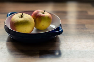 Close-up of apples on table