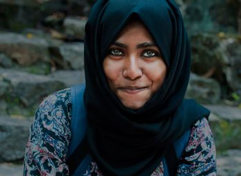 Close-up portrait of smiling teenager