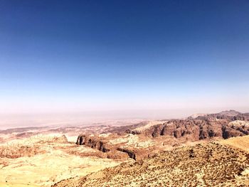 Scenic view of landscape against clear blue sky