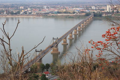 High angle view of river amidst buildings in city