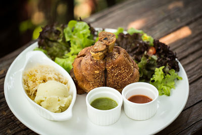Close-up of food served on table