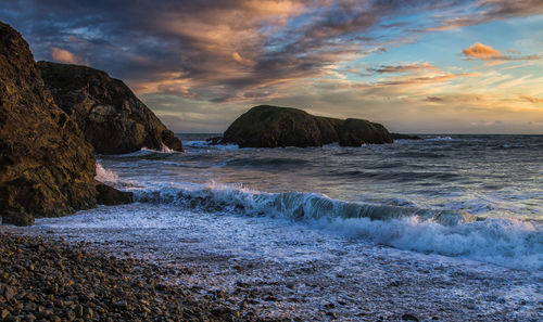 Scenic view of sea against sky during sunset