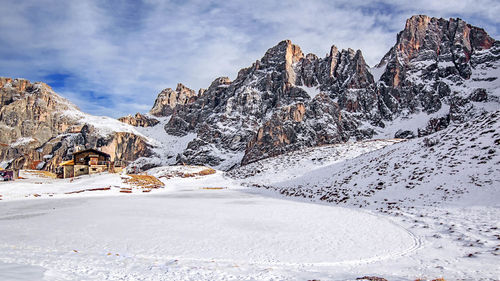 Scenic view of snowcapped mountains against sky