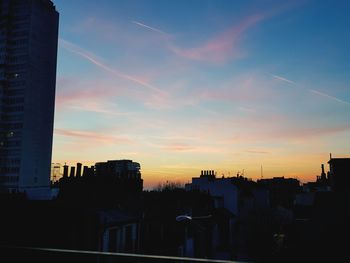 Cityscape against sky during sunset