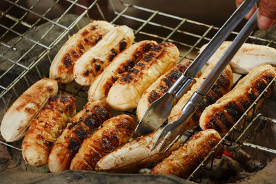 Close-up of sausage on barbecue grill