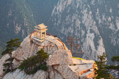 Castle on rock against sky