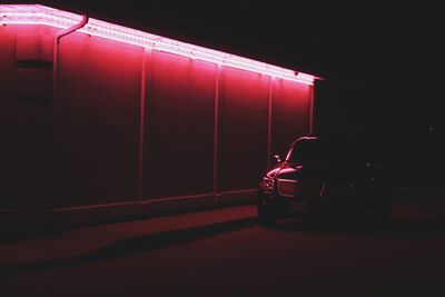 Illuminated car at night