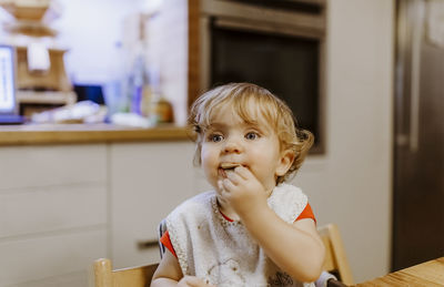 Portrait of cute girl at home