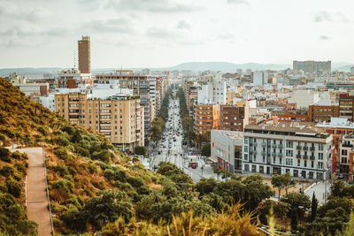 High angle view of trees and buildings against sky