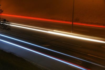 Light trails against sky at night