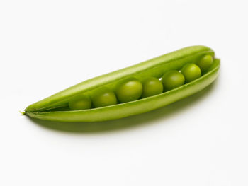 Close-up of green beans against white background