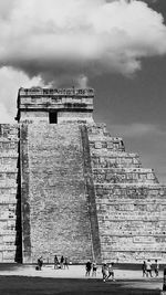 Built structure against cloudy sky