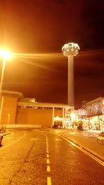 Illuminated street light at night