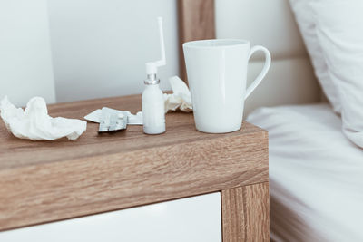 Close-up of coffee cup on table