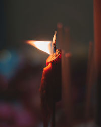 Close-up of burning candle