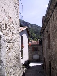 Alley amidst buildings in town
