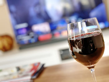 Close-up of wine glass on table