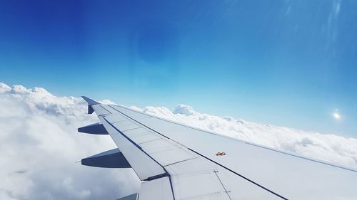 Low angle view of airplane flying in sky