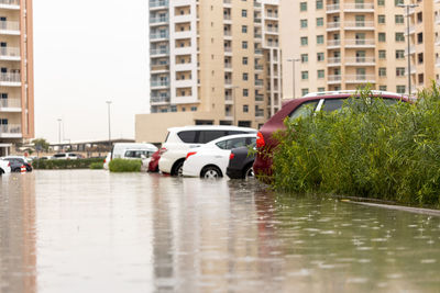 Wet car on street in rain