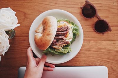 Midsection of person preparing food on table