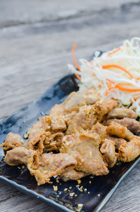 Close-up of served food in plate
