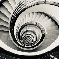 Directly above shot of spiral staircase in building