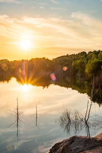 Scenic view of landscape against sky during sunset