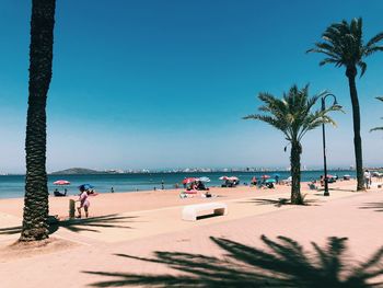 Scenic view of beach against clear sky