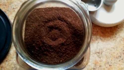 High angle view of coffee in cup on table