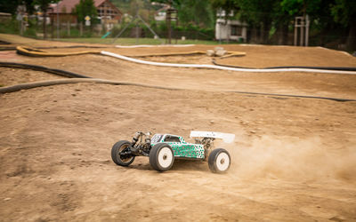 High angle view of toy car on field