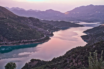 Scenic view of mountains against sky during sunset