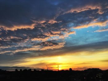 Scenic view of dramatic sky during sunset